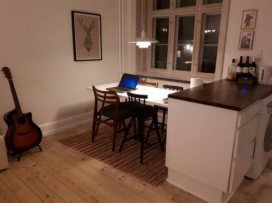 Living room and kitchen - wine, dine and cook the in the same space