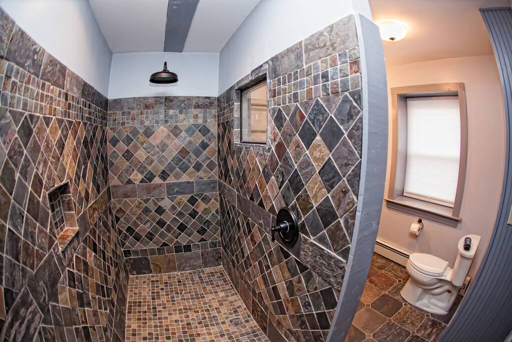 Extra large walk in shower, with rain forest shower head Into The Wilds