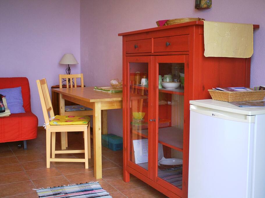 Your own living room/kitchen. The cabinet is equipped with all the cooking utensils you might need.