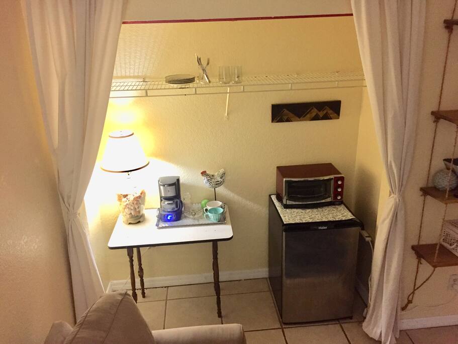 Kitchenette with coffee maker, toaster oven, and mini fridge for your convenience.