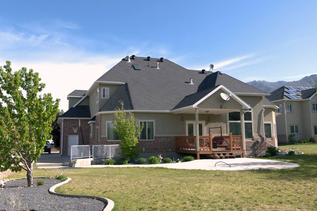 Rear of Home. To the left are the steps to the basement separate entrance door.