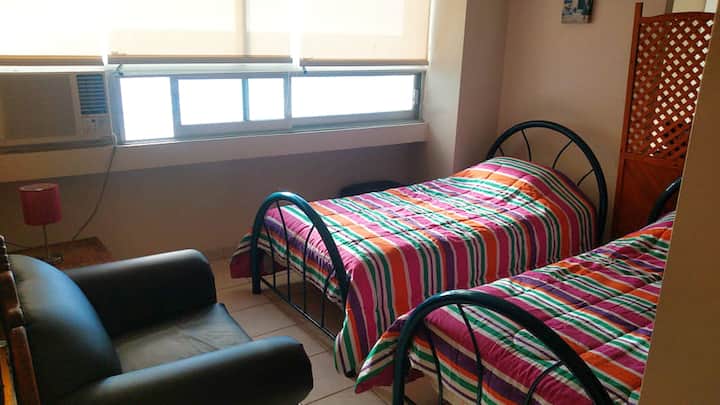 Deuxième chambre (semi-privée avec vue sur l'océan) 2 lits simples