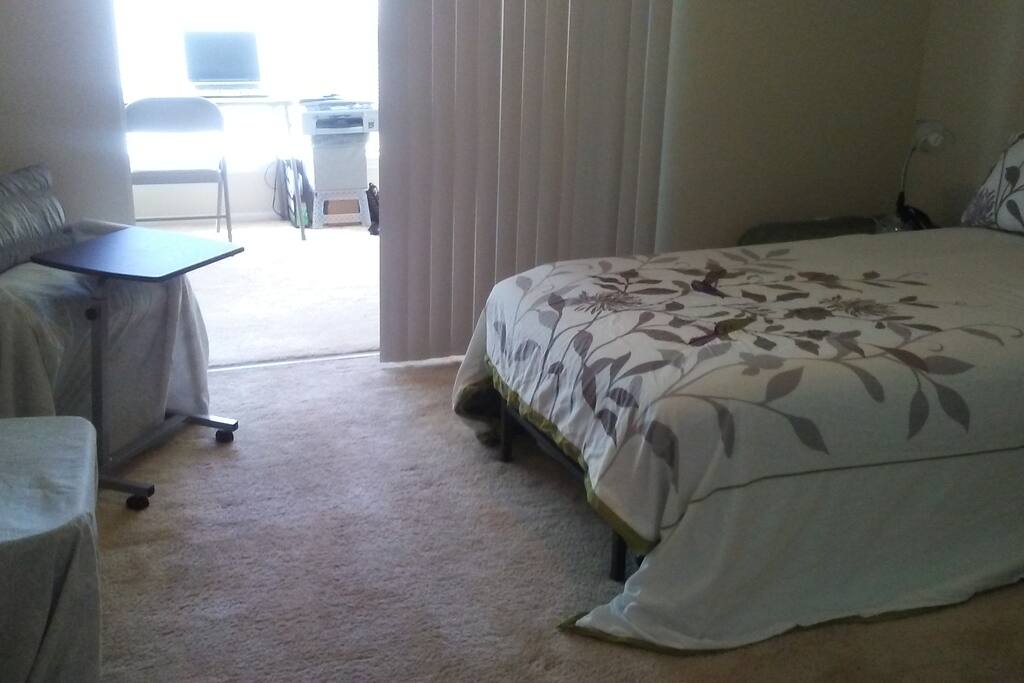 Bedroom with memory foam mattress and XL twin bed