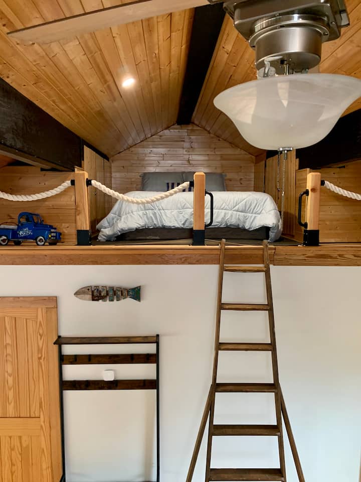 Queen bed in the loft bedroom