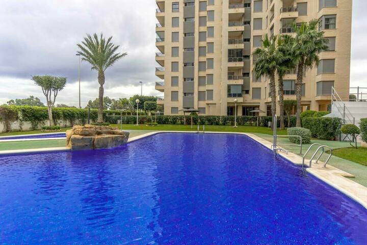 Cozy apartment in a luxury condominium by the sea.