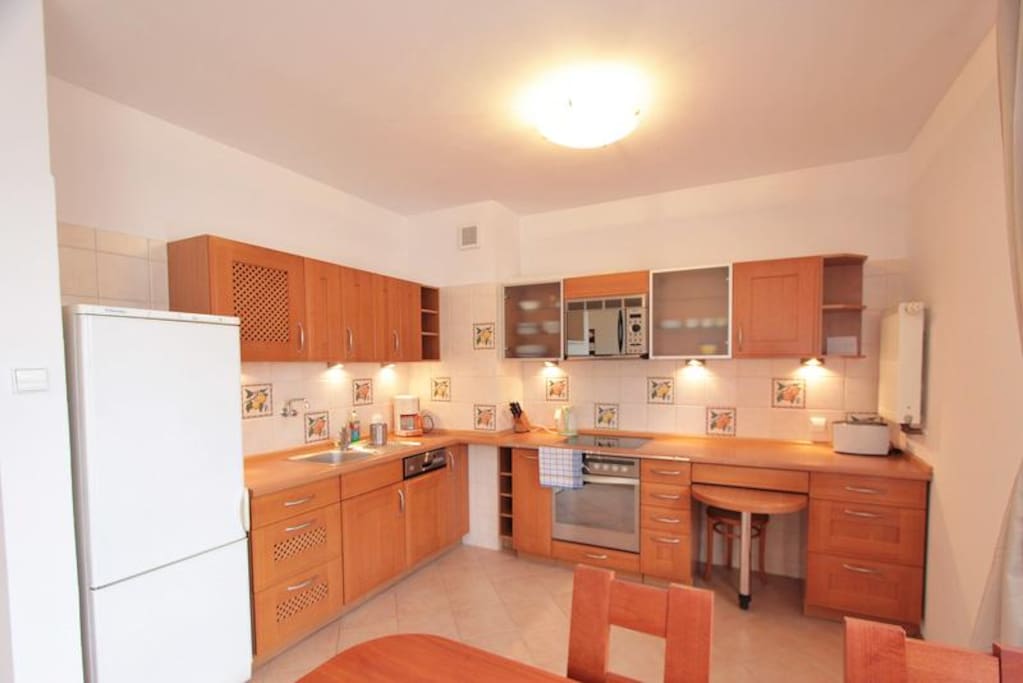 A kitchen connected with a living room
