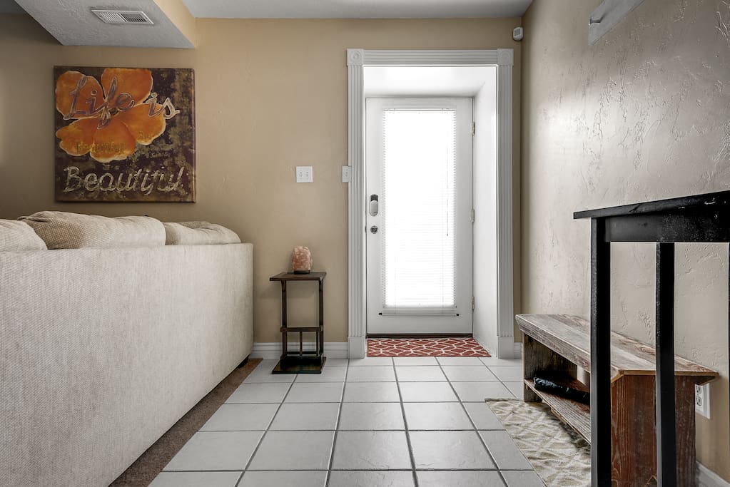 Brightly lit entryway provides natural lighting throughout the unit.