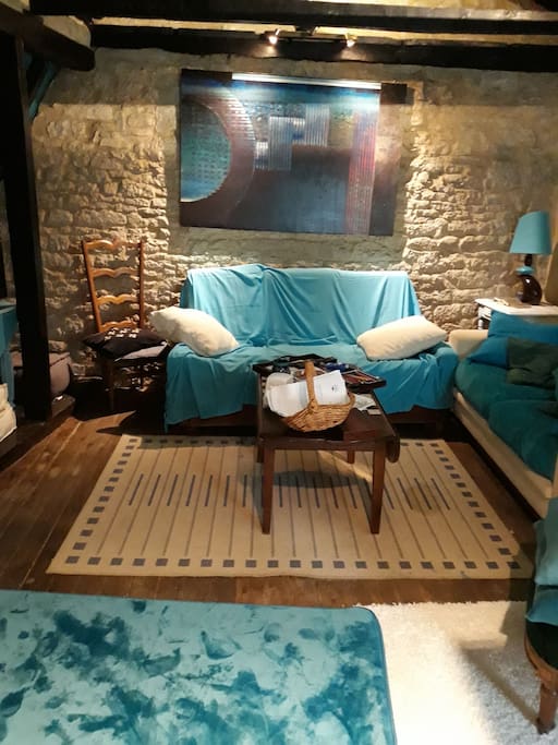 Salon avec canapé convertible