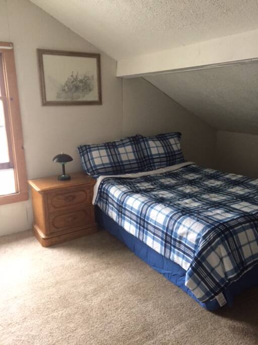 This is bedroom 5 upstairs with a full size bed