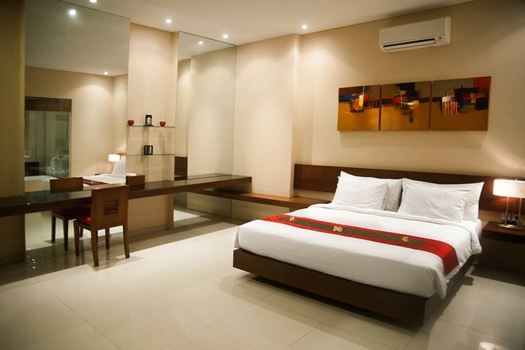 Sleep well in the spacious air-conditioned bedroom complete with Wifi, computer desk and private en-suite bathroom.