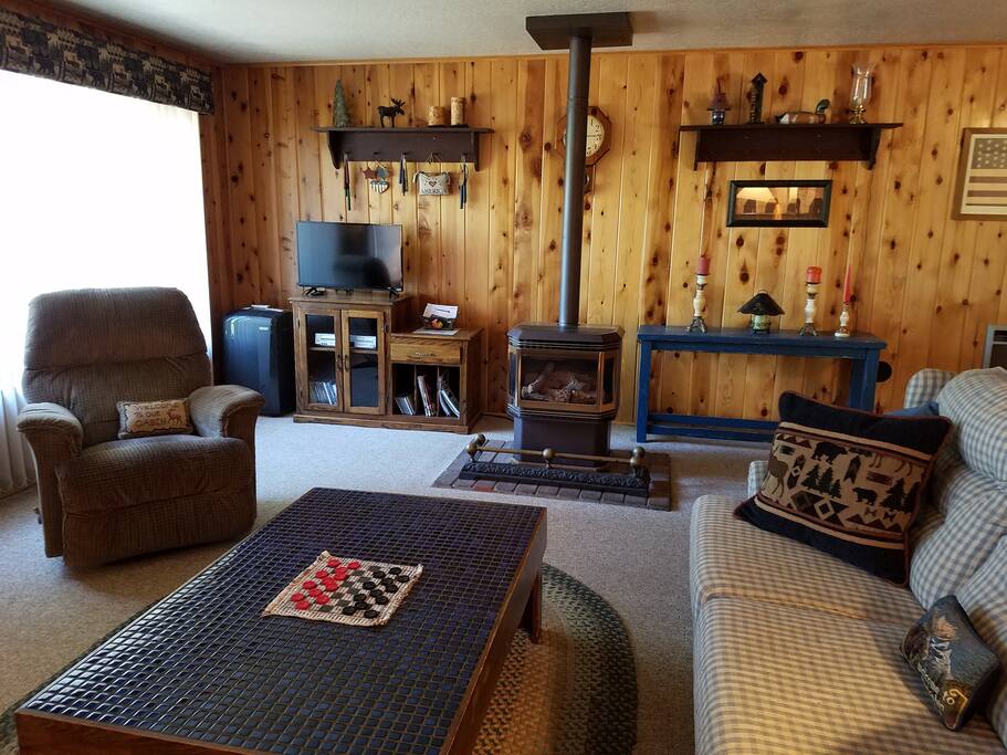 Living area with Dish TV and lots of videos to chose from