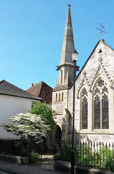 The Sunday School is behind our church, through the arch.