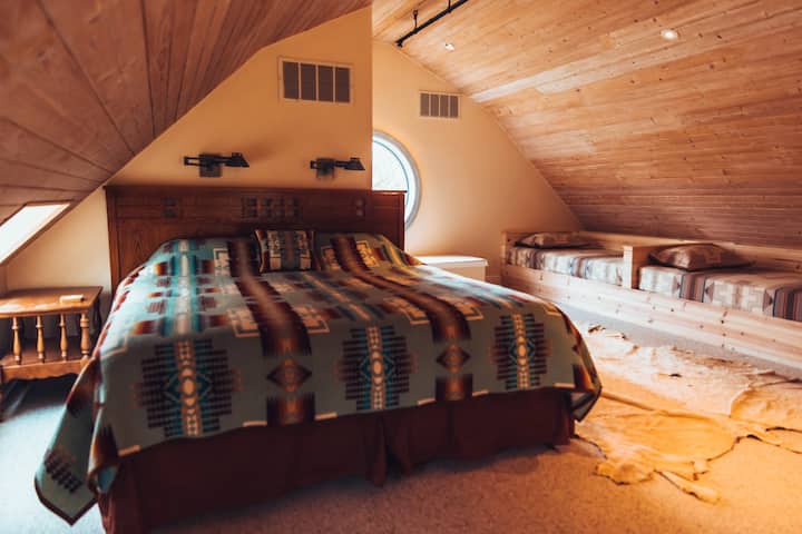 The Barn: Loft style master bedroom