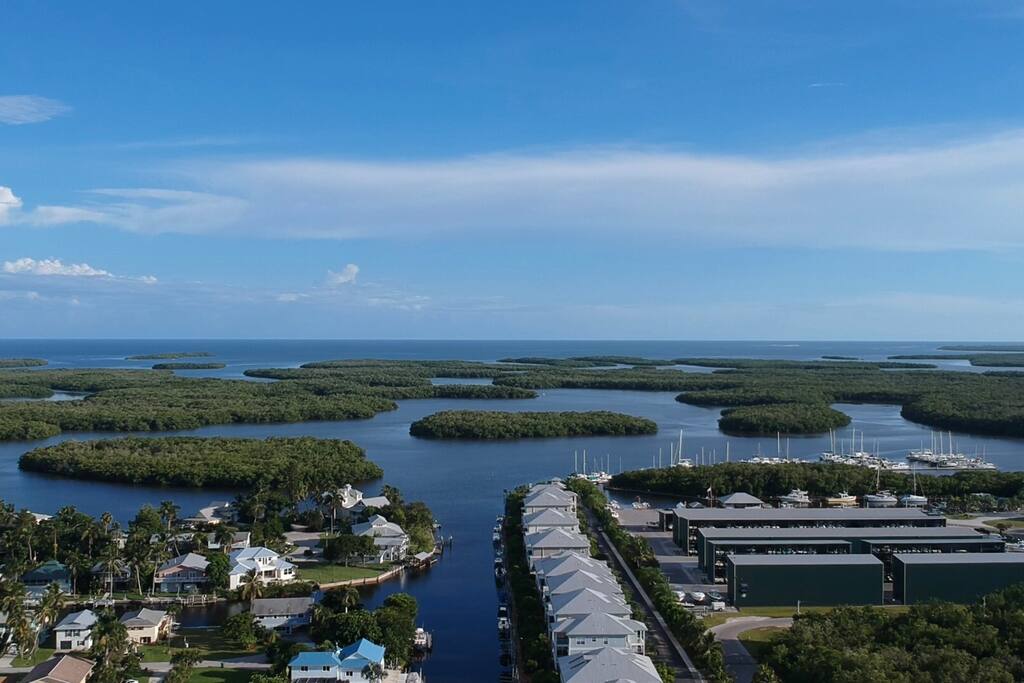 Higher aerial view of our canal showing some of those 10,000 islands are not very far away!
Calusa Island Marina is on the right where you can rent jet skis and boats to explore the 10,000 Islands