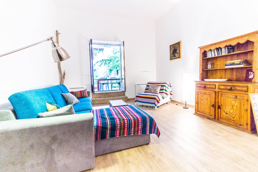 Sunny living room with terrace access