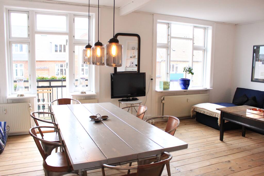 Spacious living and dining room with balcony