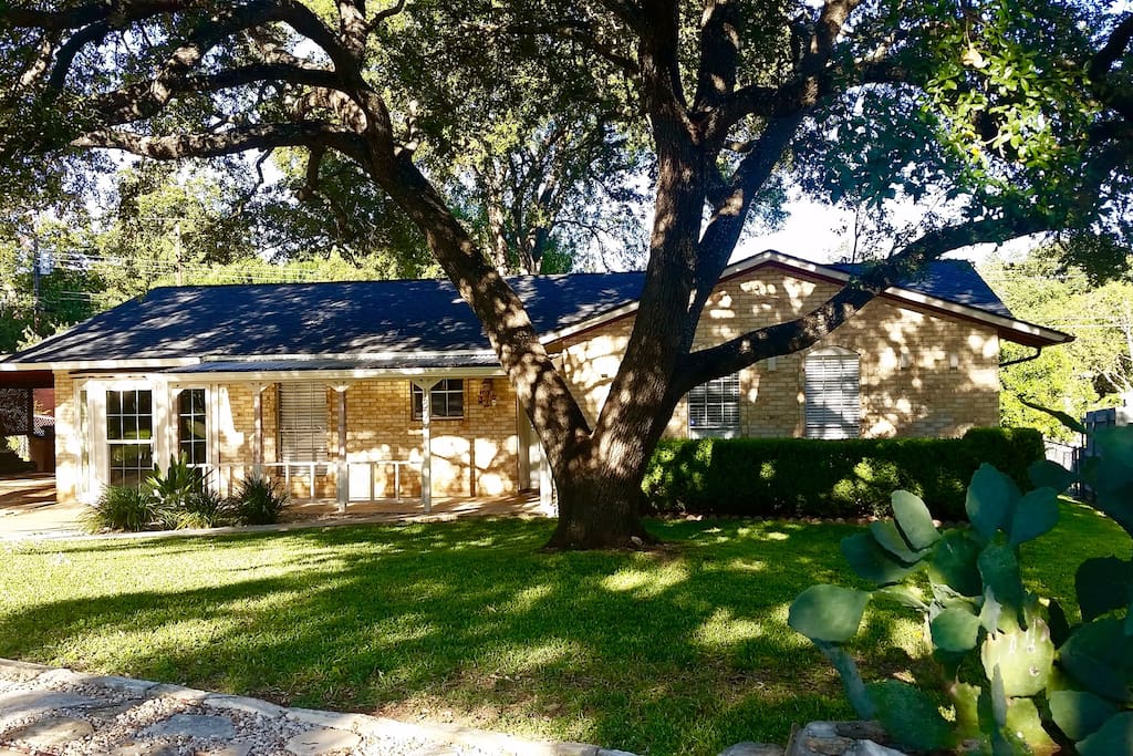 Emerge Yourself Austin Style in an Authentic Austin Stone Home & Historic Oak Trees....Right Here - Where You Need To Be!