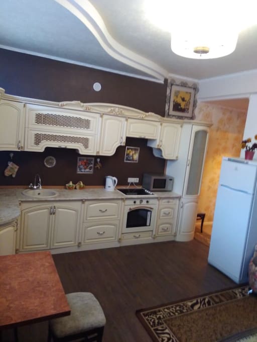 Kitchen with appliance/ dishes/ silverware etc