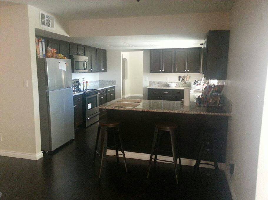 Spacious Kitchen With Beautiful Granite Counter