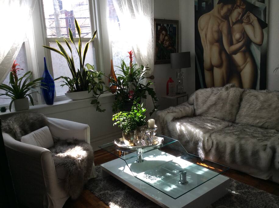 I love this room. Full of art. Comfortable sofa. Great reading light. My guests have called it. The most beautiful creative room. It's yours to enjoy..
