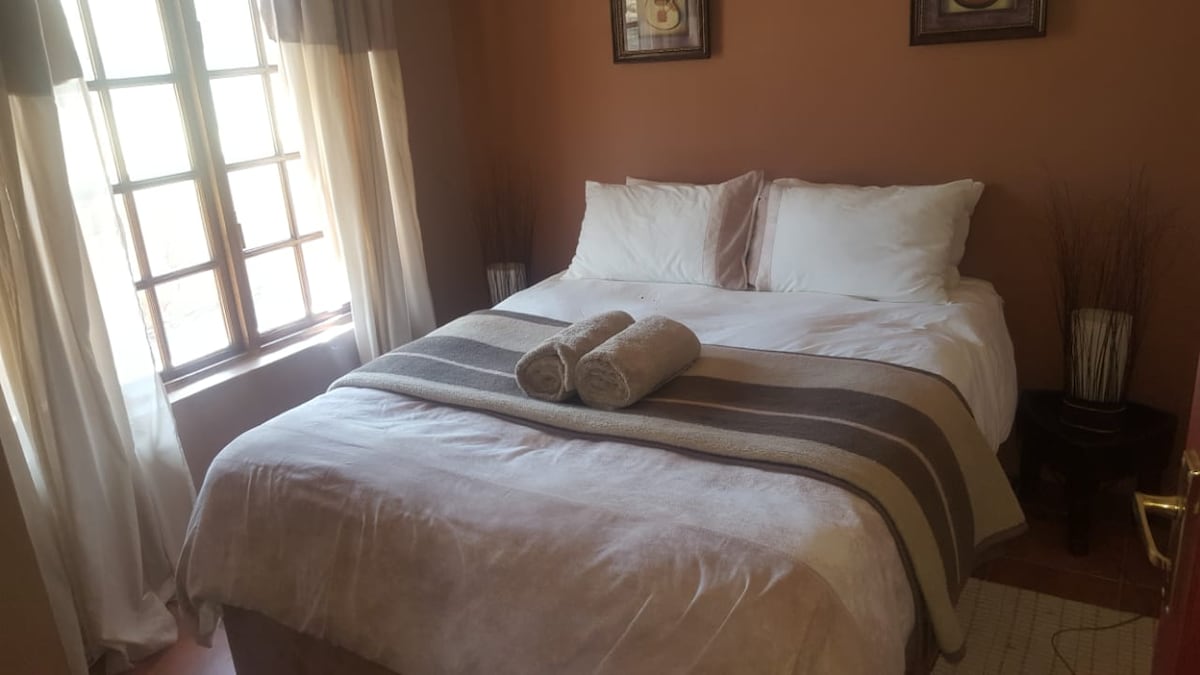 Small bedroom in the large cottage with a double bed.