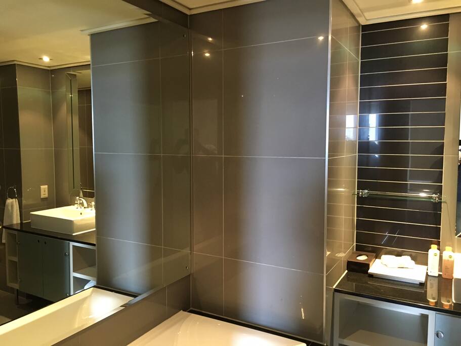 two of the 3 bathrooms have a bathtub...