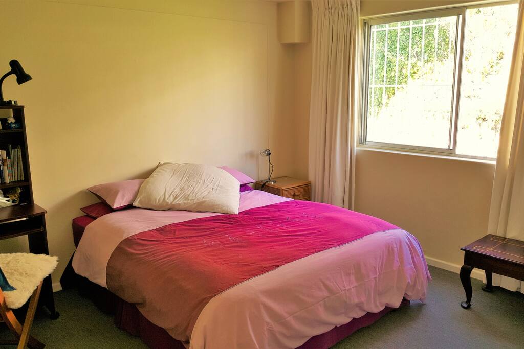 Light and sunny bedroom. Lots of peace and quiet. All bedding and ironing facilities provided.