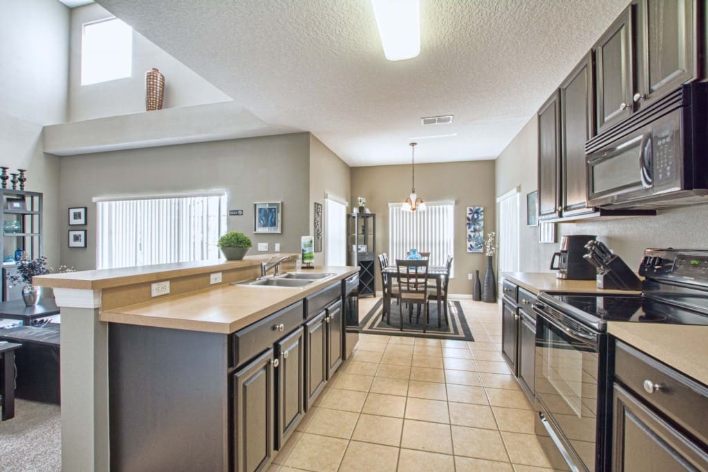 Enjoy your friends’ company as you whip up a meal in this elegantly modern kitchen.
