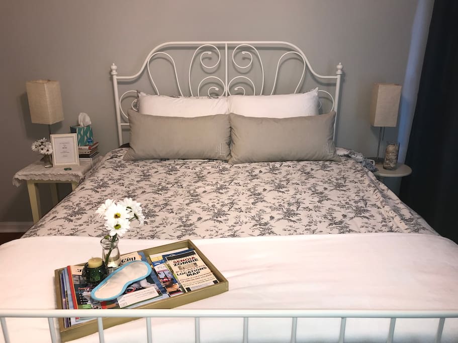 Queen bed with French doors for privacy