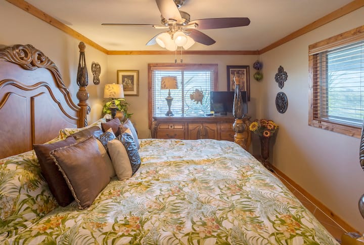 Master bedroom with King Posturepedic mattress and luxury bed linens