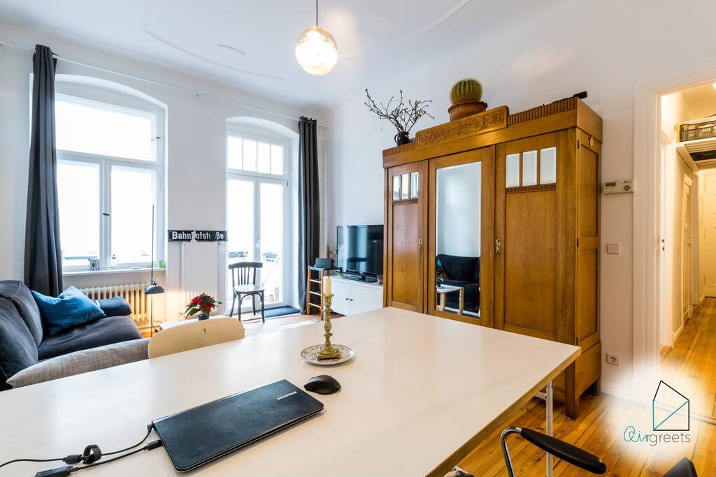 The bright living room has a charming interior which makes you feel right at home.