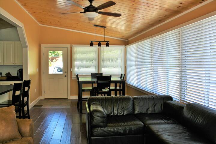 Outside Of Park Home With Fire Pit Deck And Picnic Table