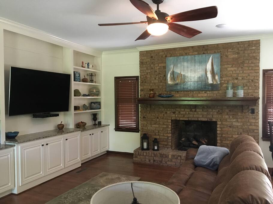 65" SMART TV, 2 comfy couches, gas fireplace