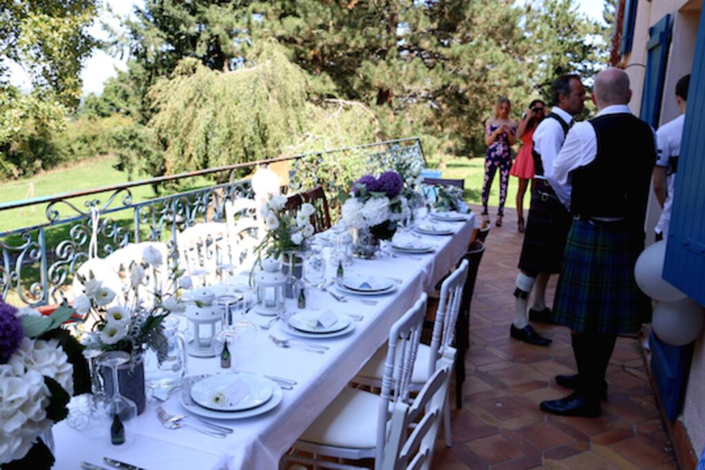 Terrace set for wedding lunch