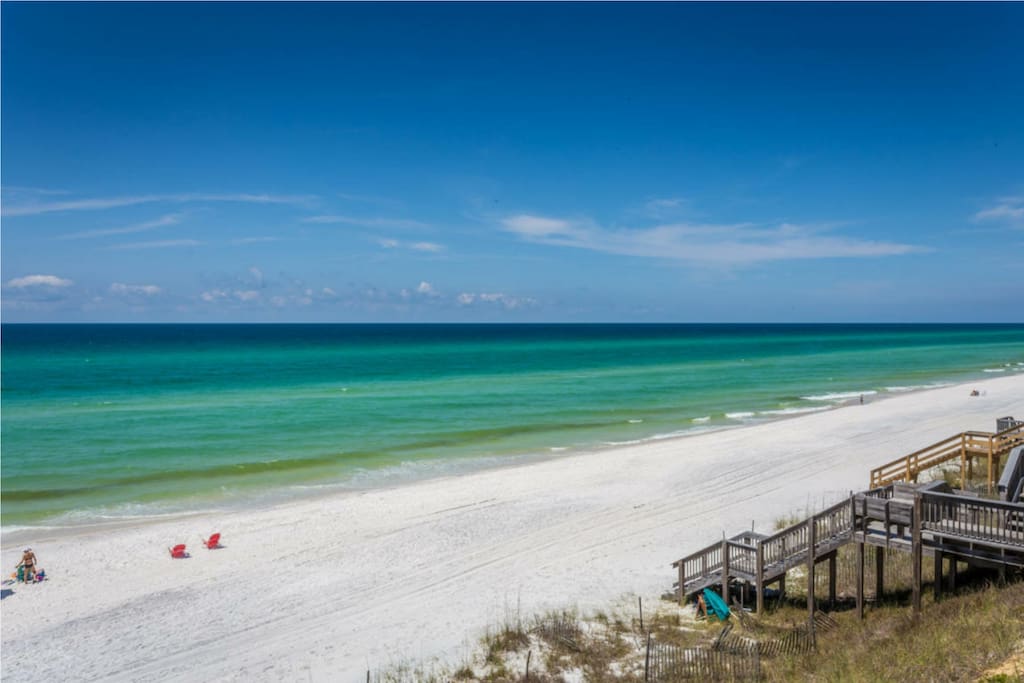 Across the street only steps to the Beach with a private access!