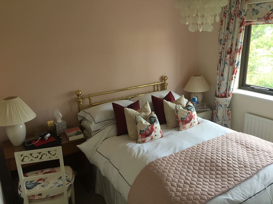 Light cosy room overlooking oak trees and garden in peaceful location.