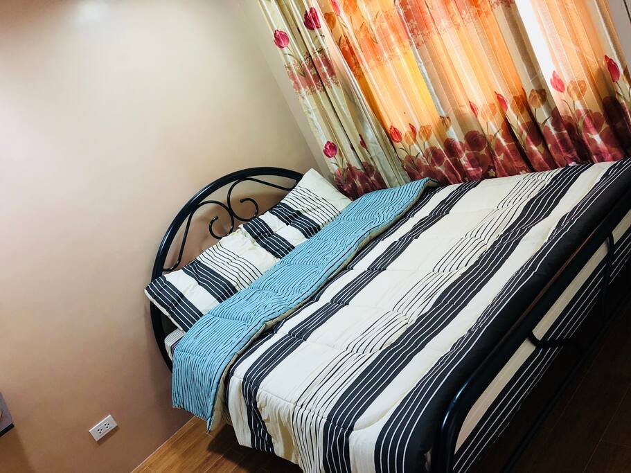 Master Bedroom with ensuite bathroom (hot/cold shower) and Queen Size bed