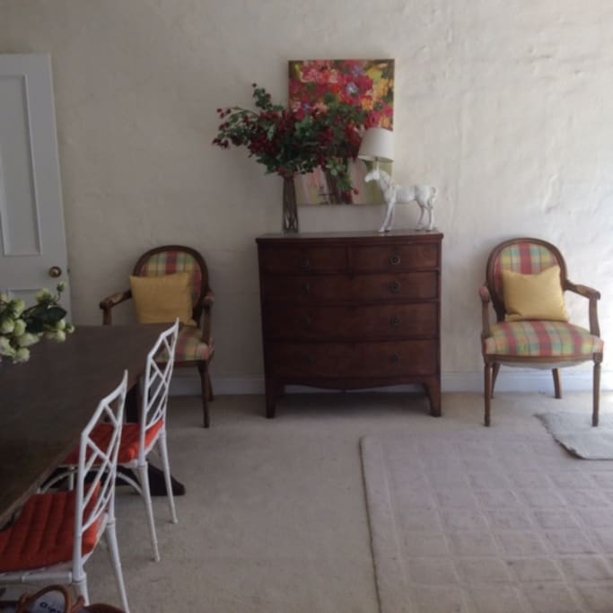 Dining area near back entrance & parking for 2 cars