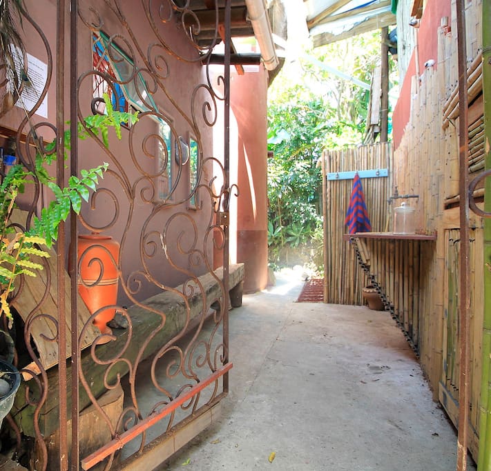 The Tree House entrance, with space for beach toys and a rinse shower for after the beach