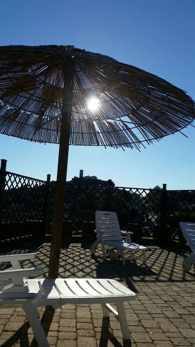 CHAIRS AND UMBRELLA