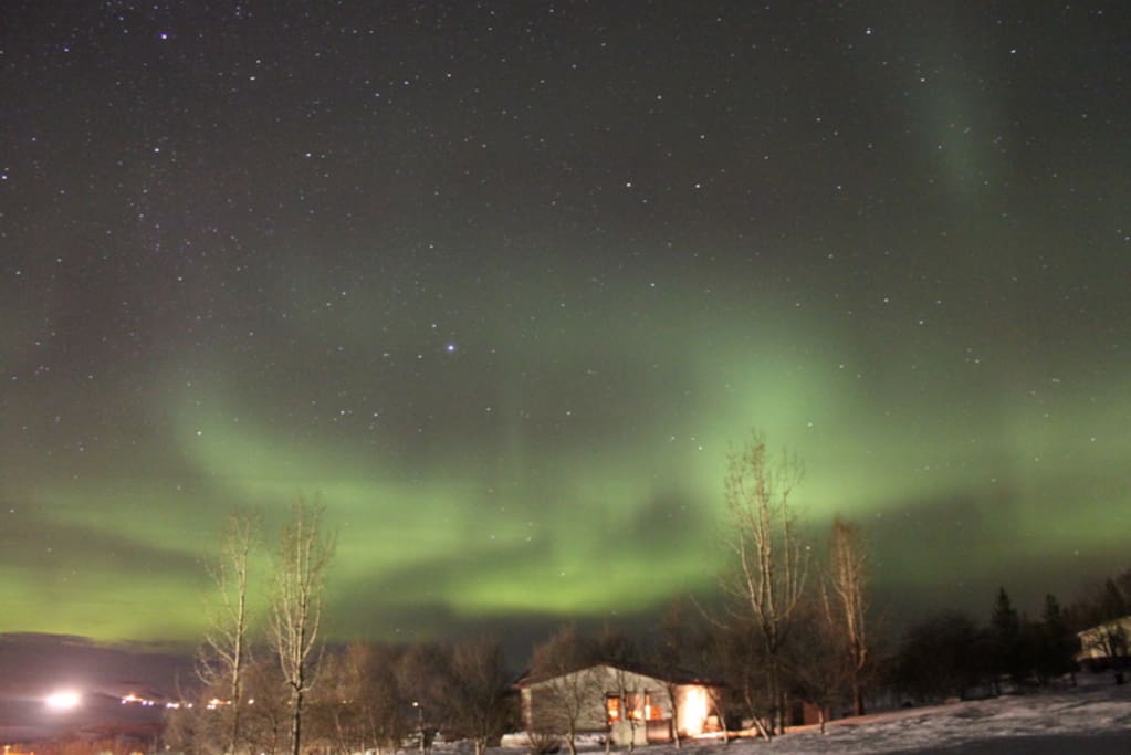 Northern Lights over Laugar Guesthouse.