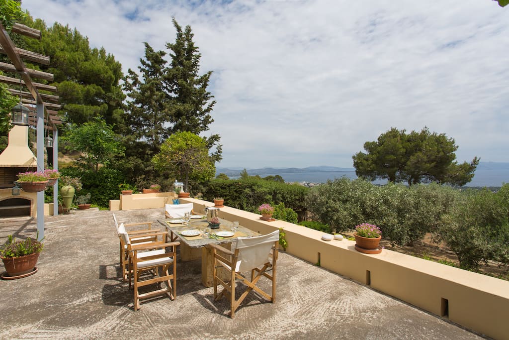 Main House Balcony Table With Stunning Views Of Marathon Bay & Evoia Island