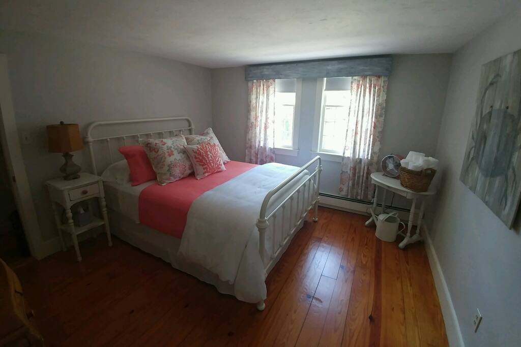 Gray Gables Room decorated in soft grays and corals.