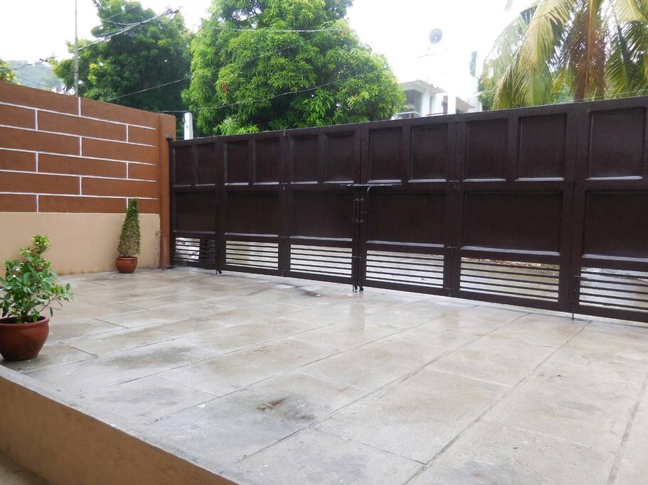 Secured Parking Lot. Can fit 3 vehicles. 2 more vehicles can park in front of the house.
