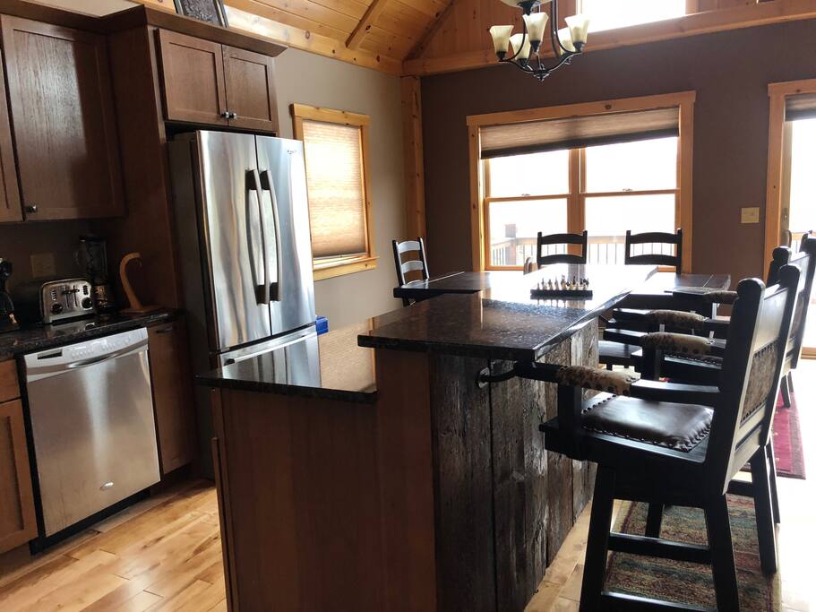 Kitchen island with bar stools