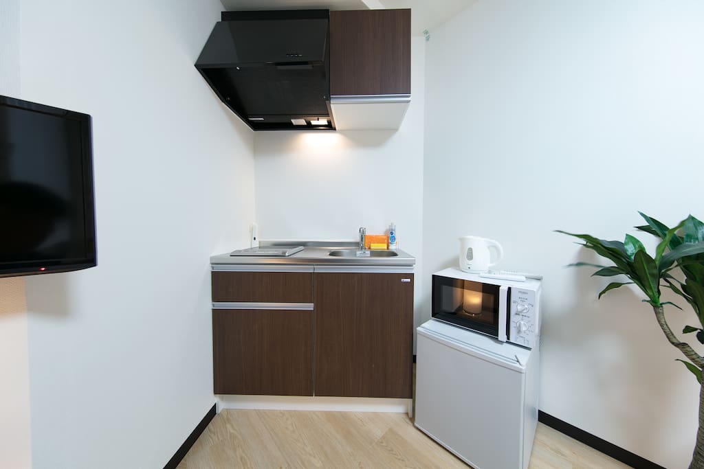 Kitchen and laundry machine! Microwave, refrigerator... its like a home sweet home isn't it? Cook for yourself using local ingredients! Or even simply warm anything you bought from stores!
