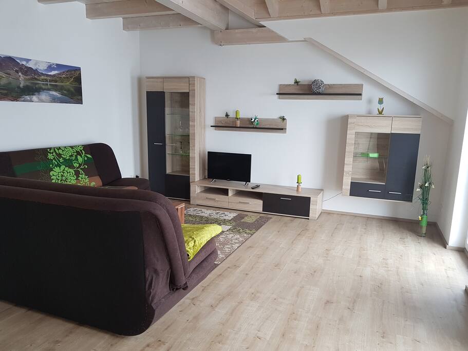 Wohnzimmer mit Balkon