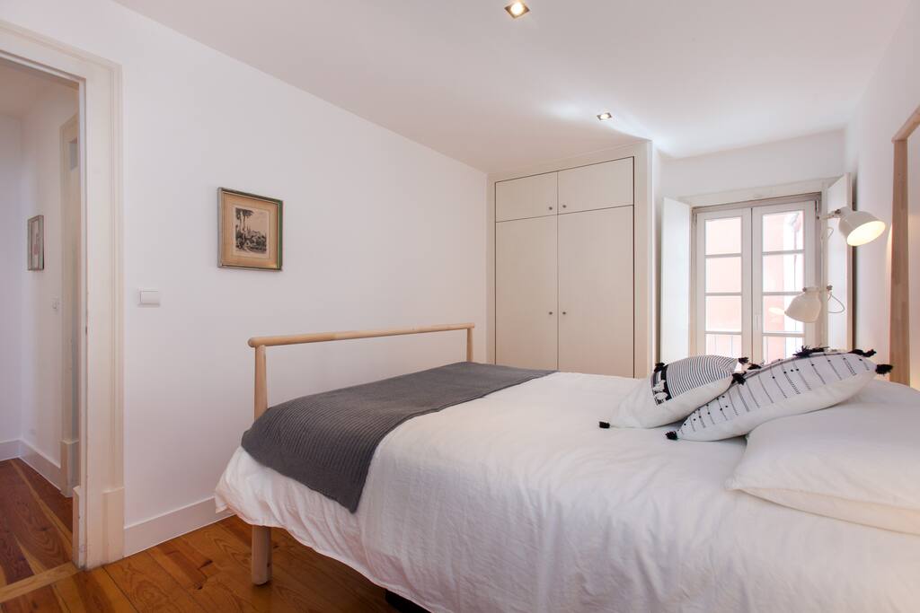 Main bedroom with small balcony