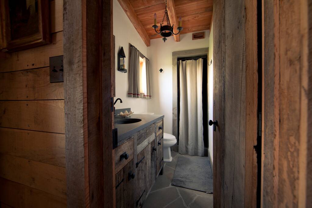 Full bathroom with walk in shower.
