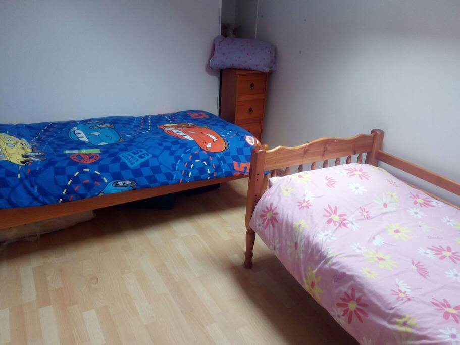 Room with 2 single beds, most suitable for children age 3 - 12